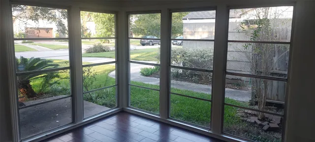 a view of a room with window from a room