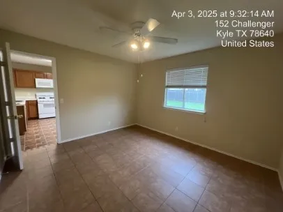 a view of a hallway with a window