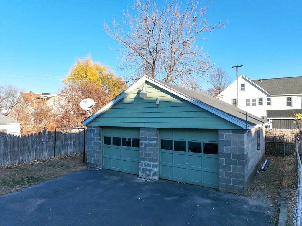 99 Lyons Street Springfield, MA 01151 - Photo 3 of 41 a house view with a outdoor space