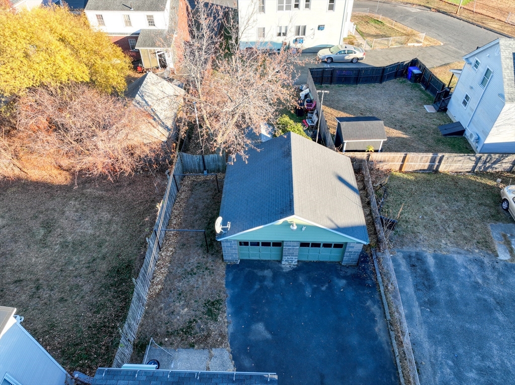 99 Lyons Street Springfield, MA 01151 - Photo 38 of 41 a terrace with outdoor seating and wooden floor
