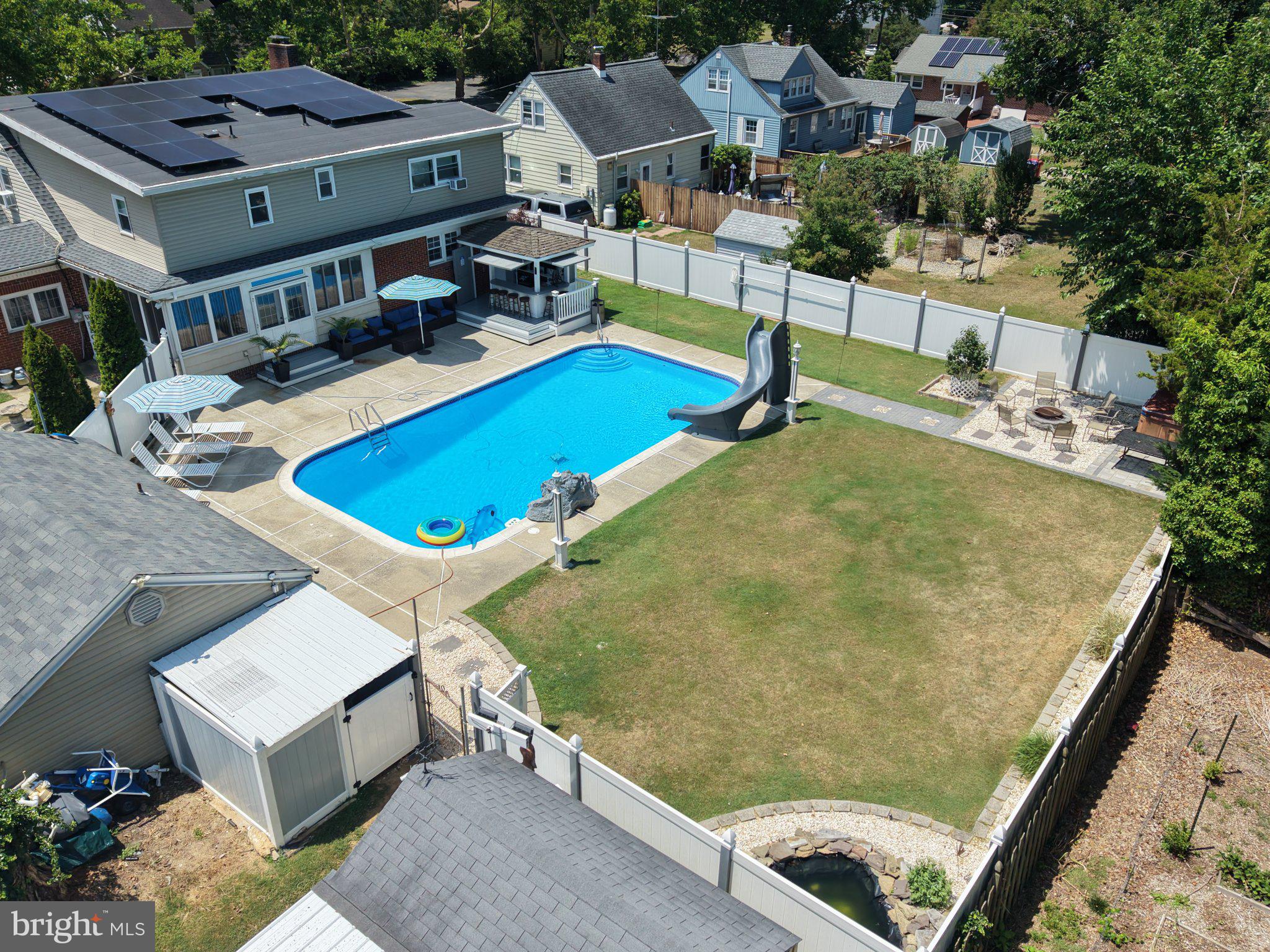 109 Rutgers Avenue Bridgeton, NJ 08302 - Photo 35 of 43 Sunny oasis with pool and slide.