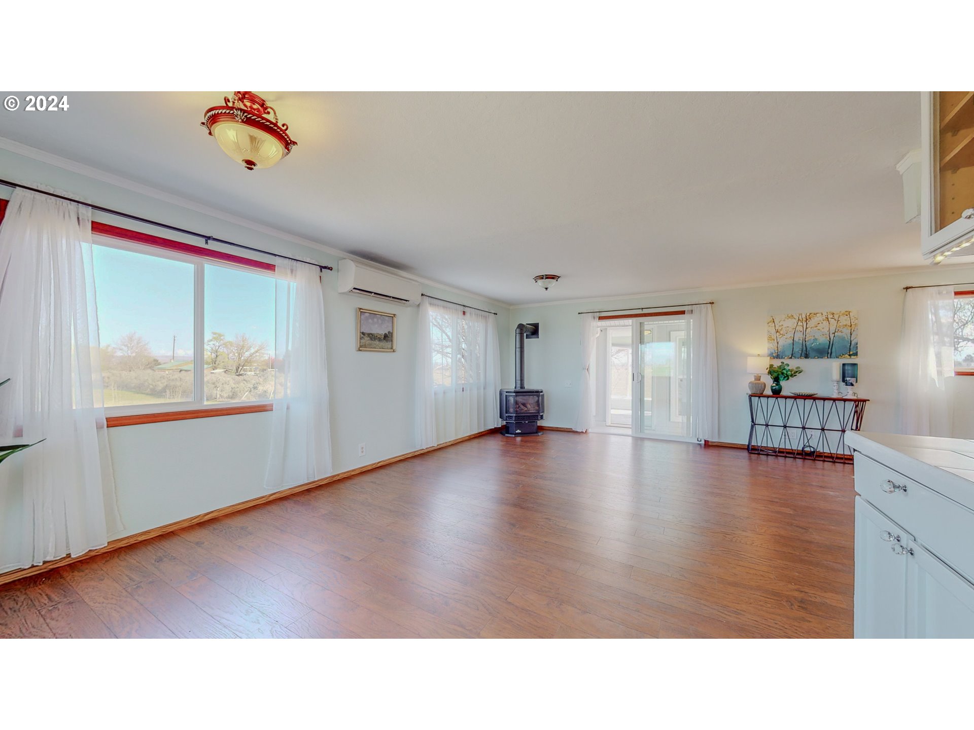 32256 West Walls Road Hermiston, OR 97838 - Photo 17 of 41 a living room with couches and pool view