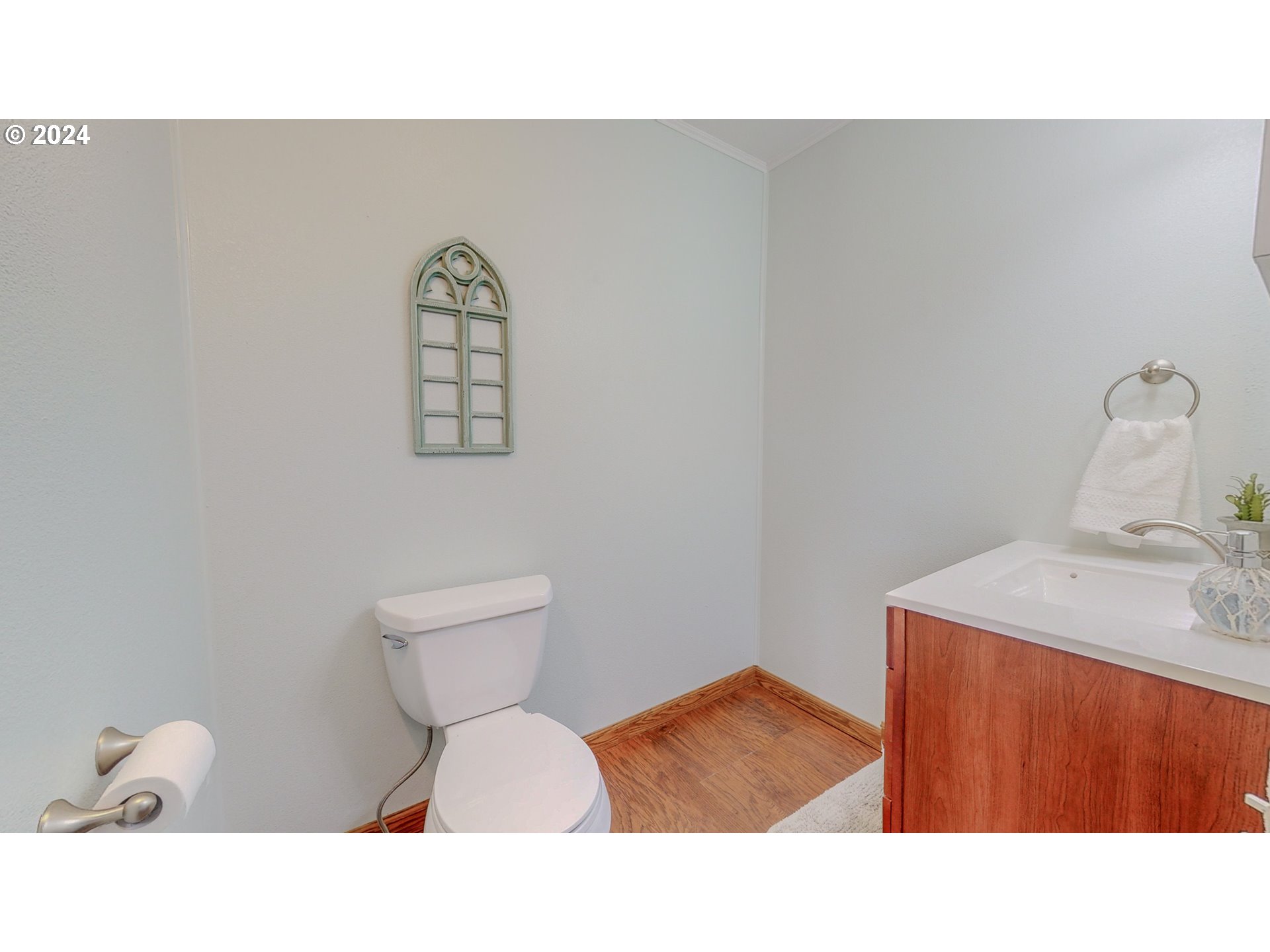 32256 West Walls Road Hermiston, OR 97838 - Photo 8 of 41 a bathroom with a sink vanity mirror and toilet