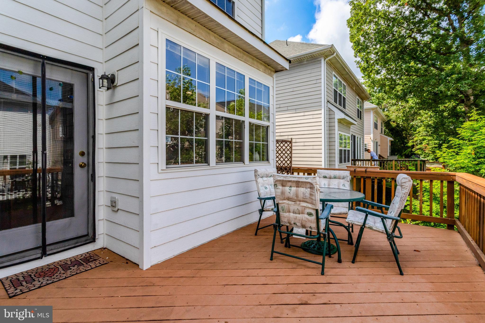 8552 Bauer Circle Springfield, VA 22152 - Photo 20 of 64 a view of a two chairs and table in the balcony
