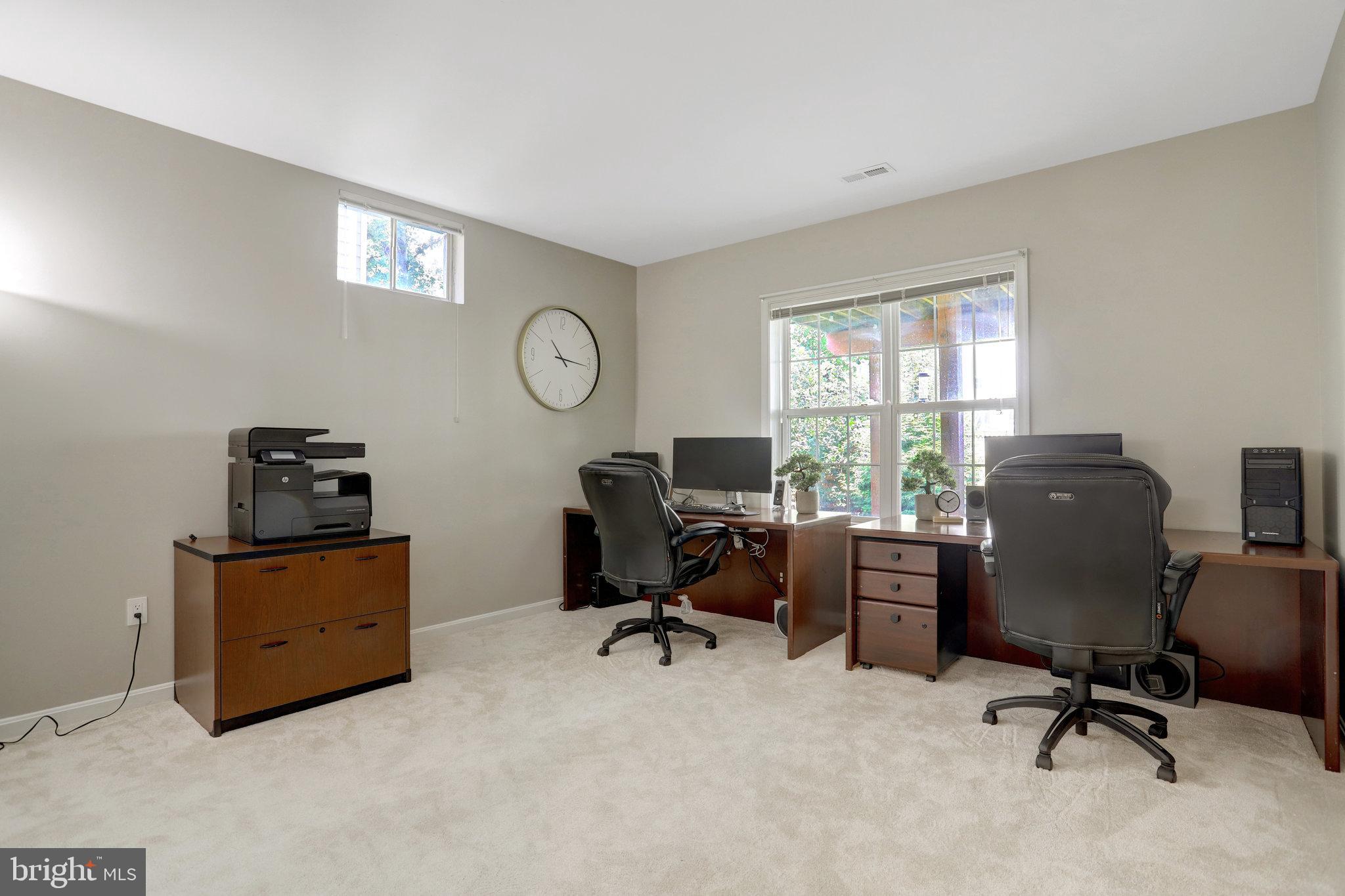 8552 Bauer Circle Springfield, VA 22152 - Photo 50 of 64 a view of a workspace with furniture and a window
