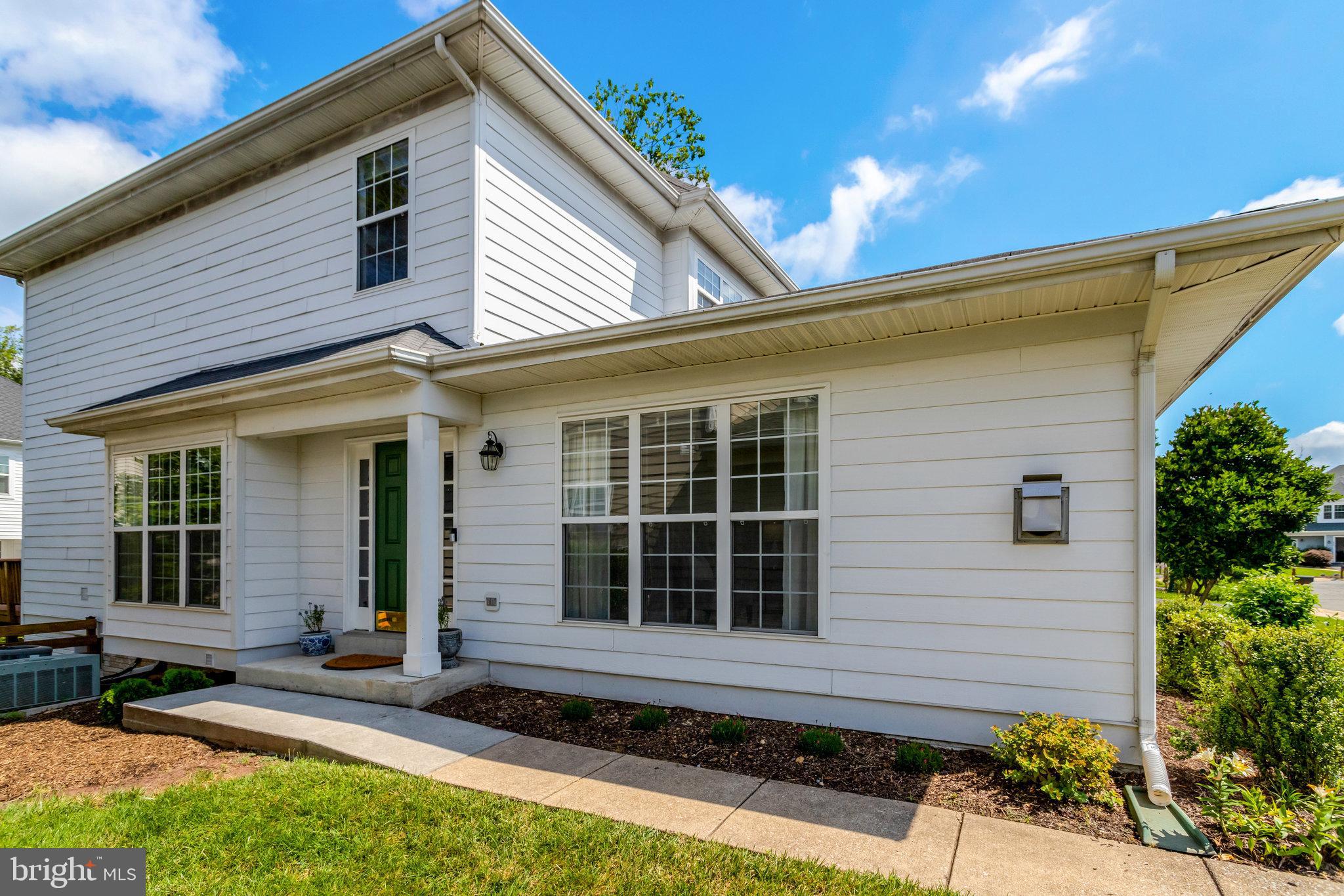 8552 Bauer Circle Springfield, VA 22152 - Photo 59 of 64 a front view of a house with a yard