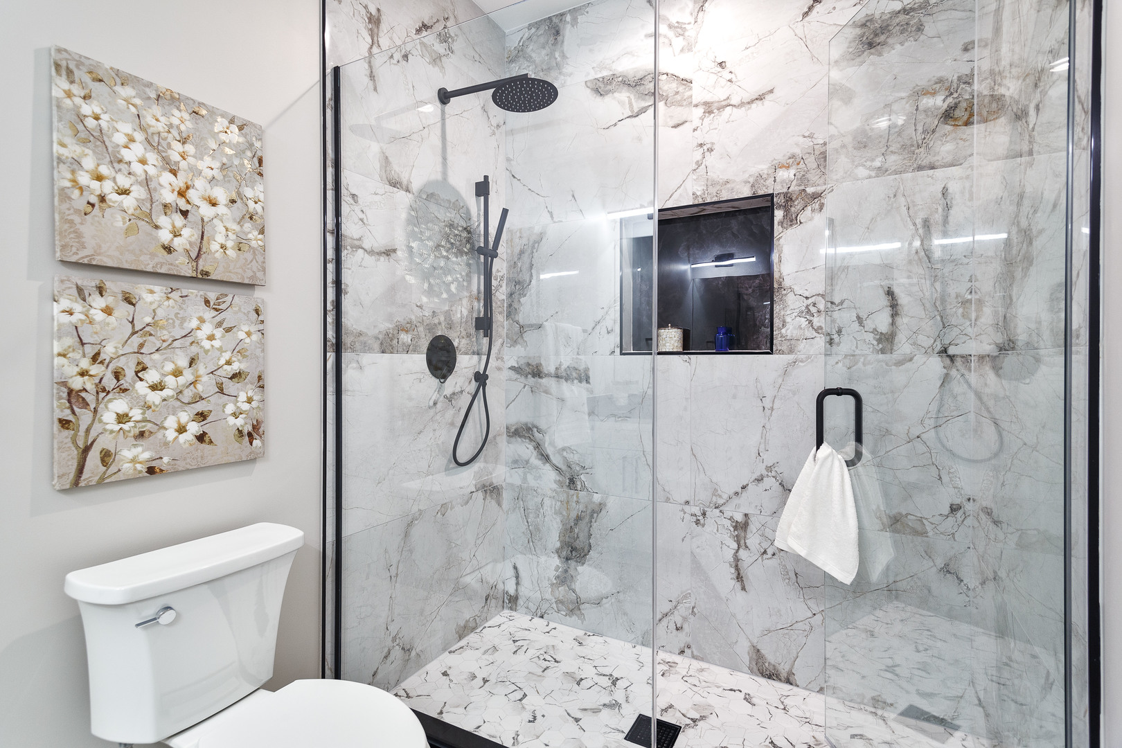 3502 North Central Avenue Chicago, IL 60634 - Photo 17 of 33 a bathroom with a sink toilet and shower