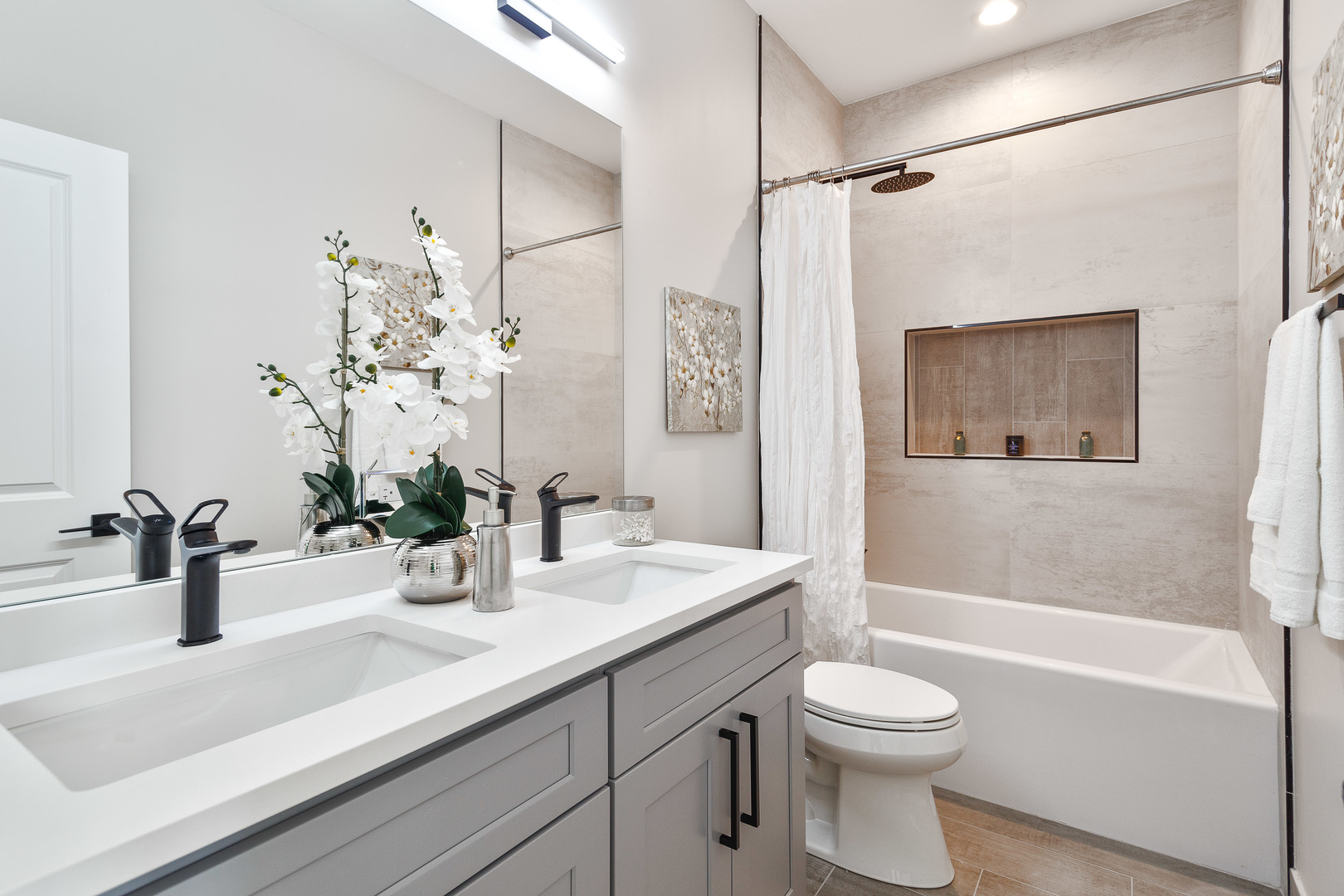3502 North Central Avenue Chicago, IL 60634 - Photo 21 of 33 a bathroom with a sink a toilet and shower