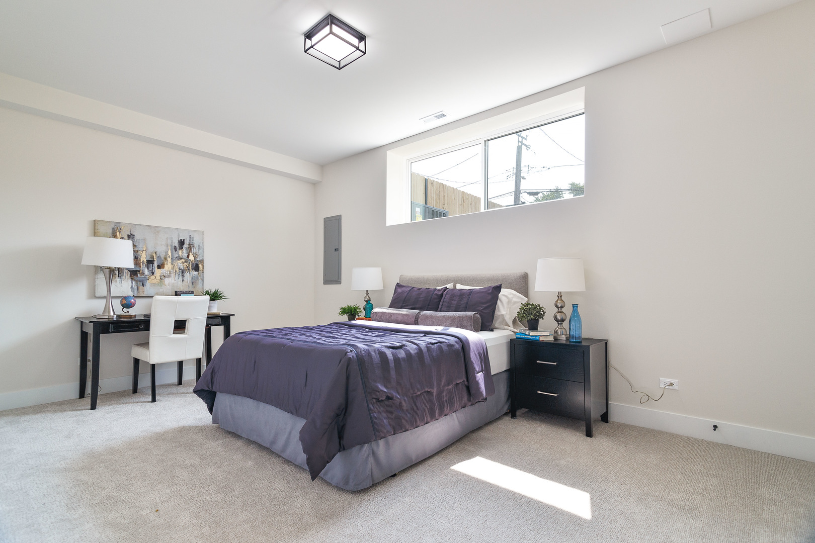 3502 North Central Avenue Chicago, IL 60634 - Photo 26 of 33 a bedroom with a bed and a table