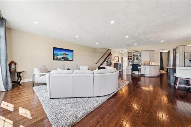 a living room with furniture and a table
