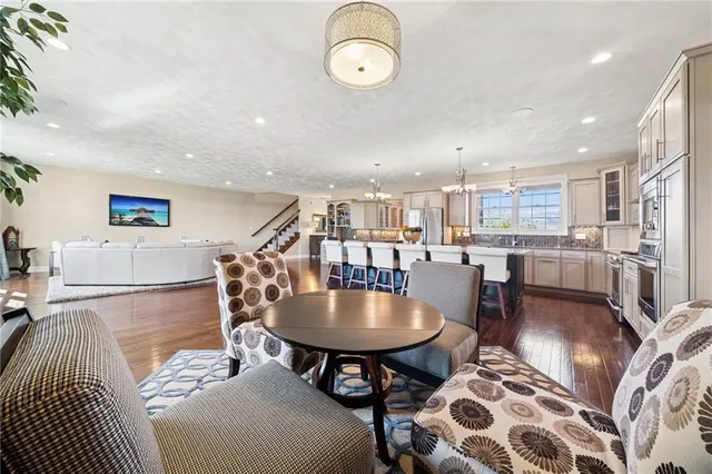 a living room with furniture and a table