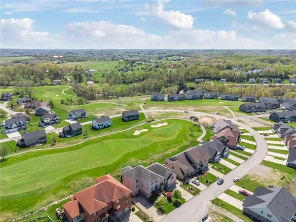 a view of a city with lawn chairs
