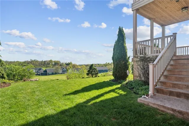 a view of a garden with an outdoor space