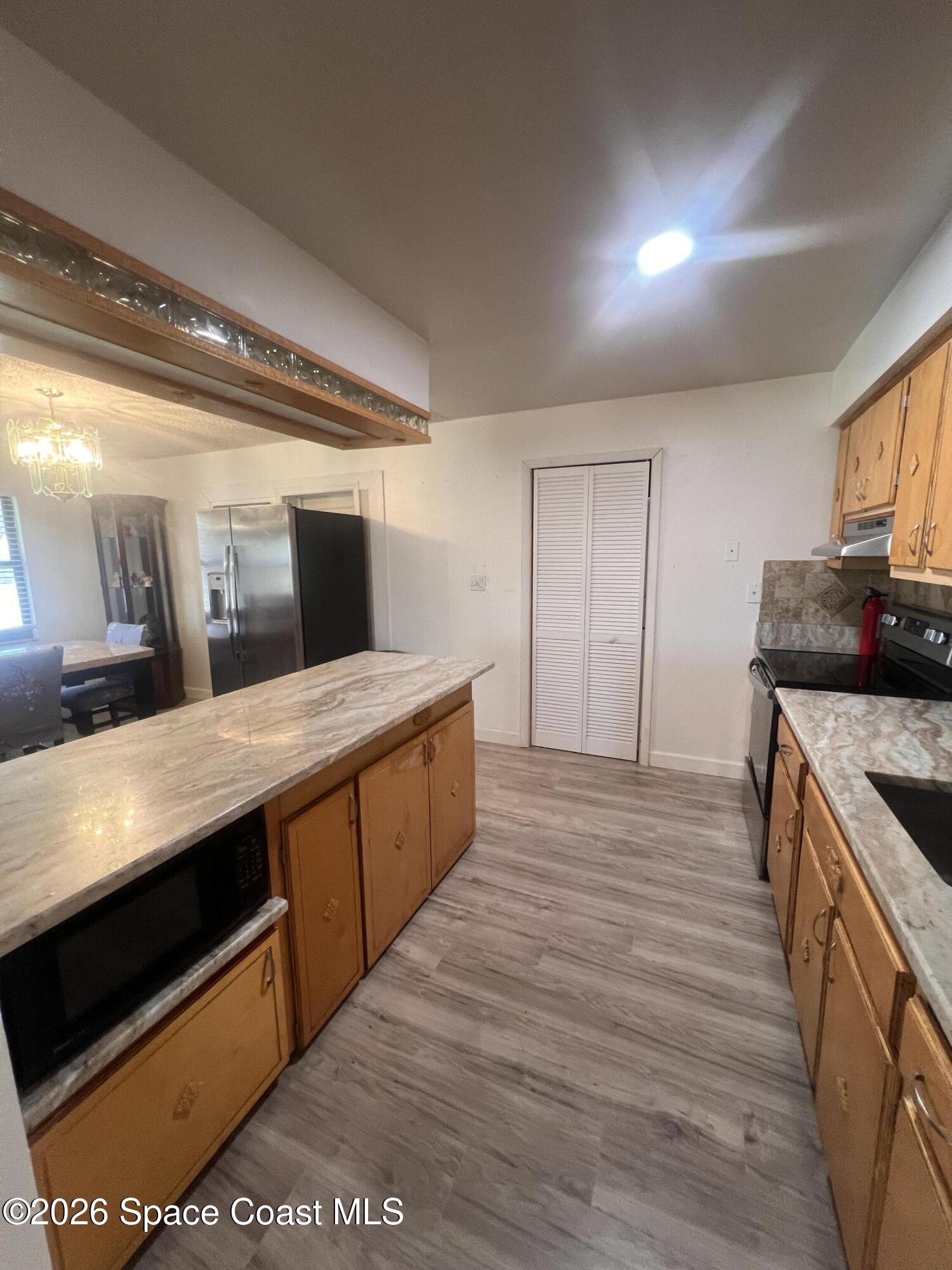 2796 Lancaster Road Melbourne, FL 32935 - Photo 10 of 29 20260529_135640097_iOS