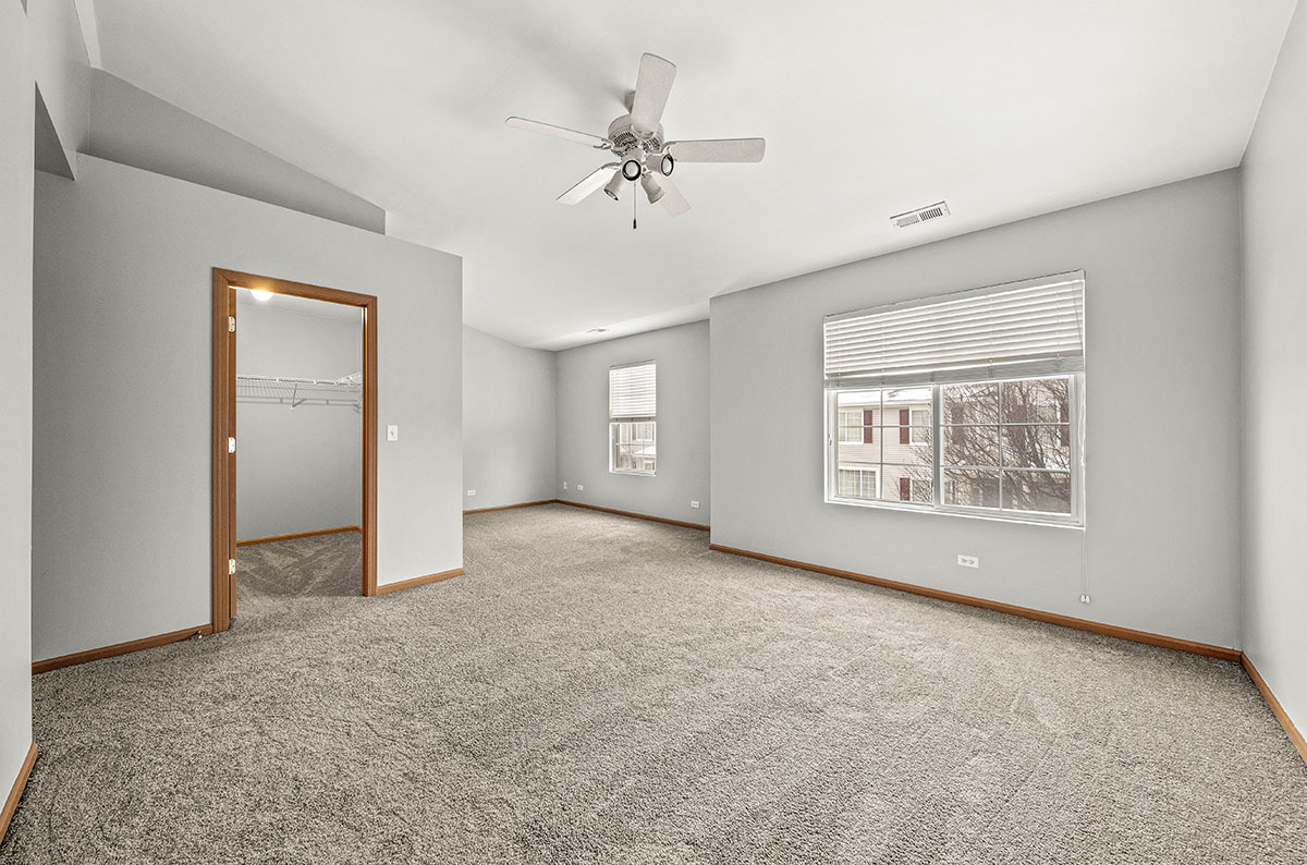 824 County Line Road Aurora, IL 60502 - Photo 12 of 18 a view of an empty room with a window