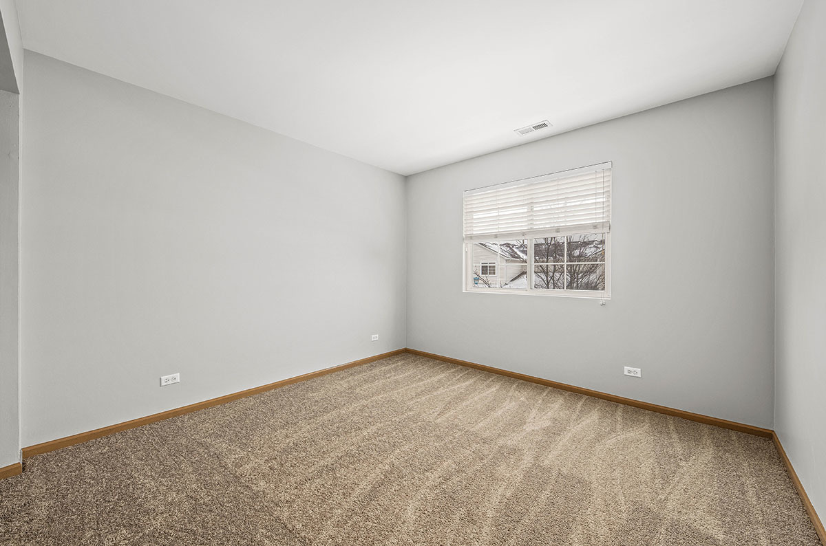 824 County Line Road Aurora, IL 60502 - Photo 16 of 18 an empty room with windows