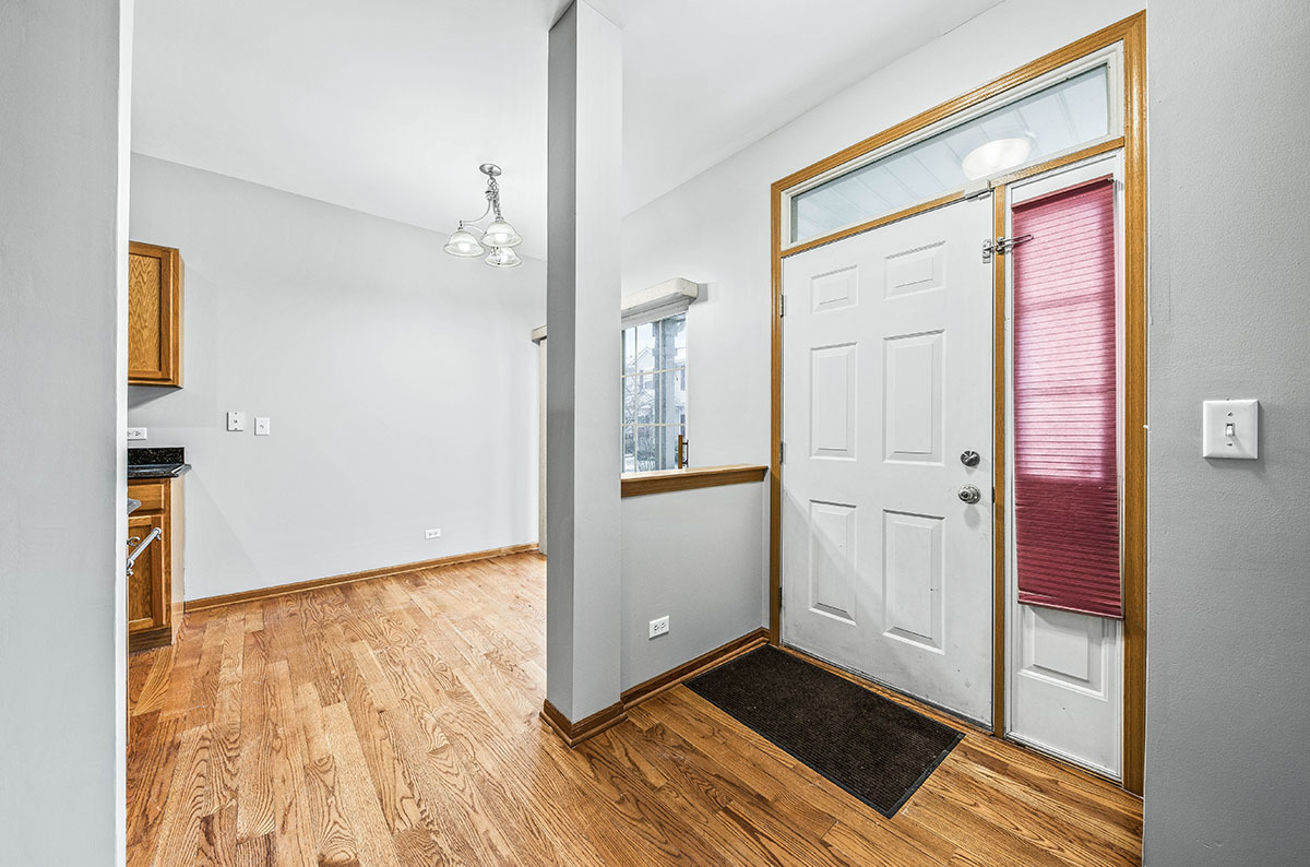 824 County Line Road Aurora, IL 60502 - Photo 3 of 18 wooden floor in an empty room