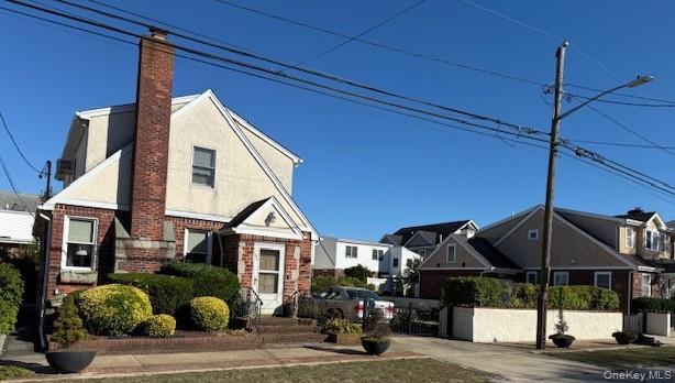 86 Lynbrook Avenue Point Lookout, NY 11569 - Photo 2 of 8 a view of a street with of a house