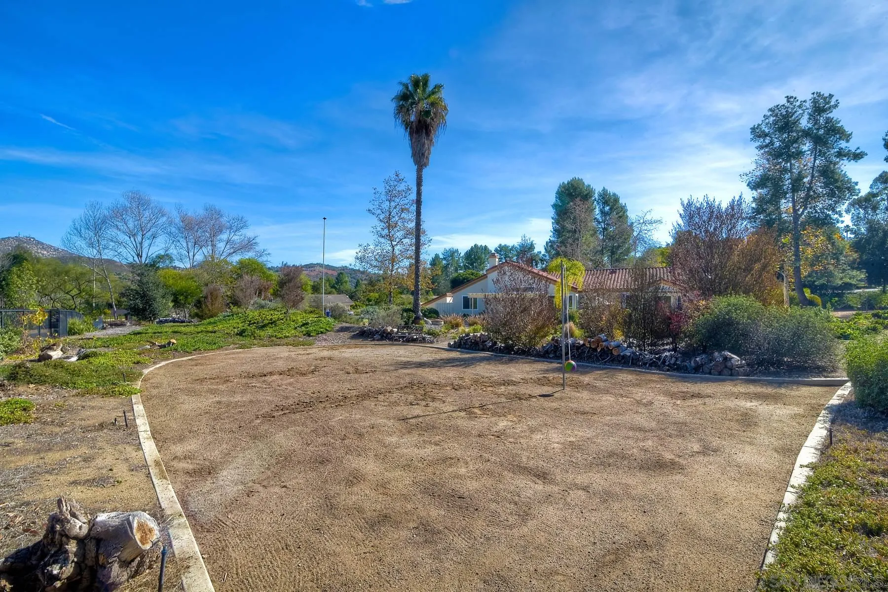 13892 Oakstand Road Poway, CA 92064 - Photo 21 of 27 a view of a garden with a tree
