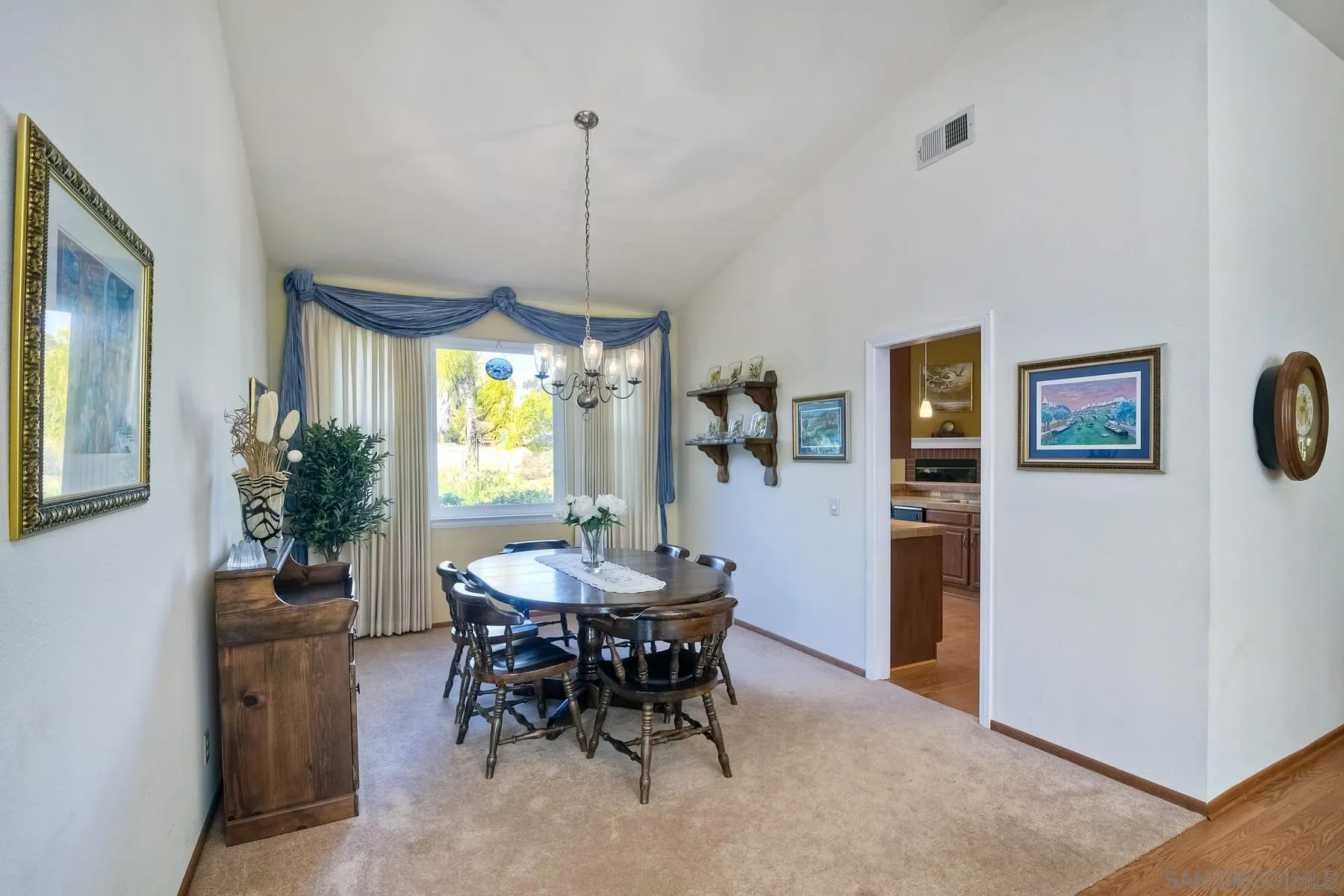 13892 Oakstand Road Poway, CA 92064 - Photo 5 of 27 a view of a dining room with furniture and window