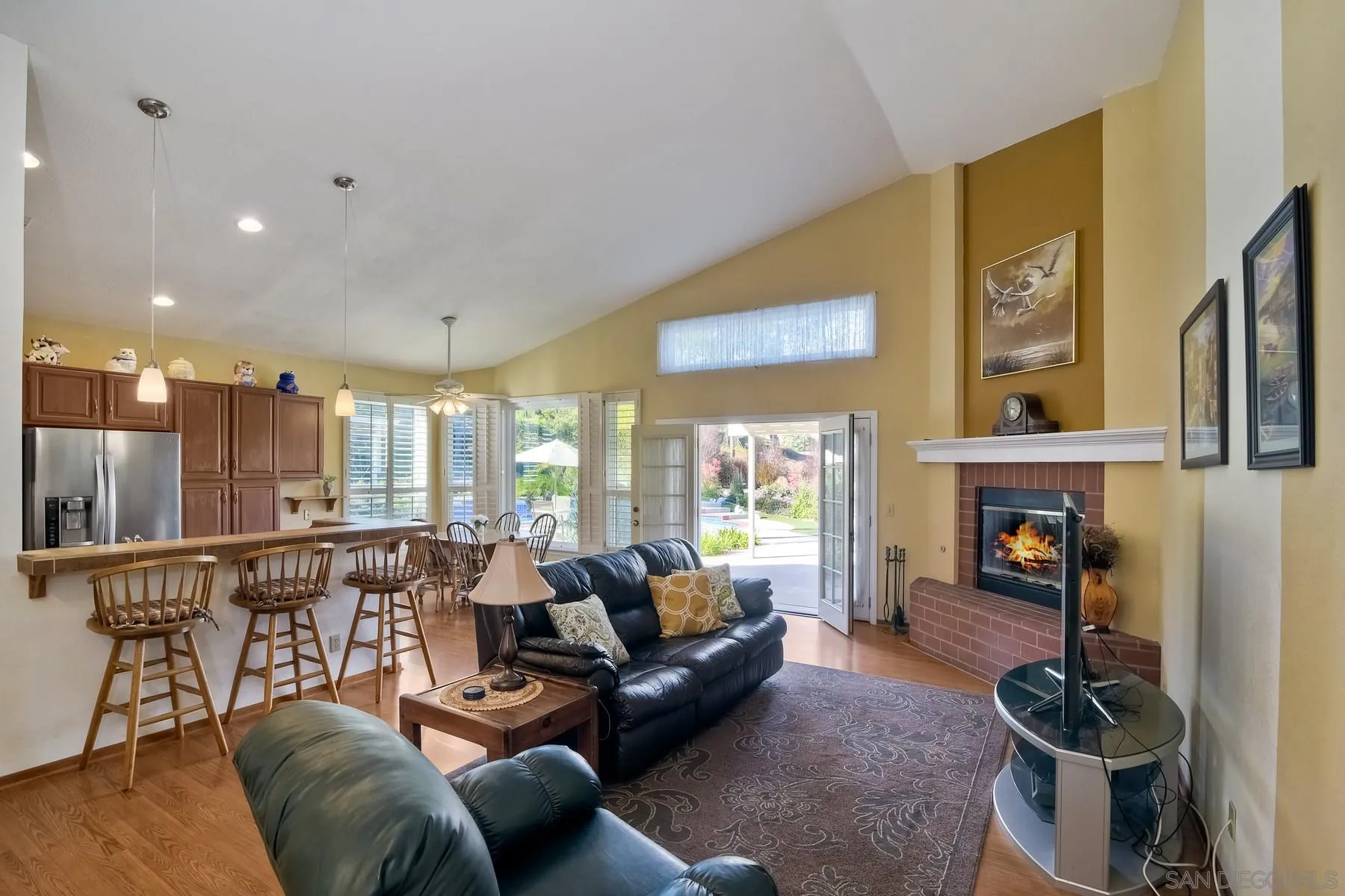 13892 Oakstand Road Poway, CA 92064 - Photo 8 of 27 a living room with furniture and a fireplace