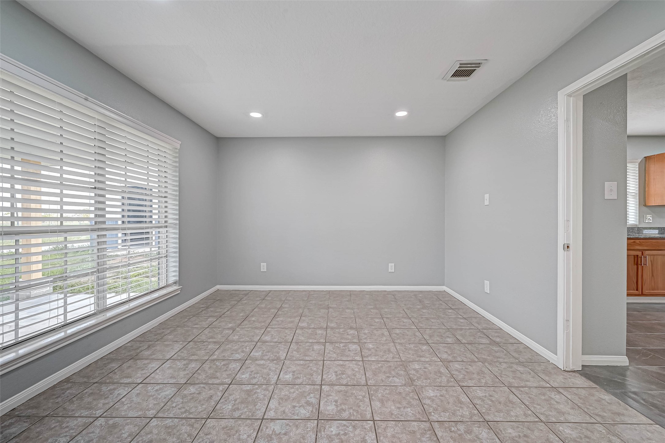 7520 Vincik Ehlert Road Rosenberg, TX 77471 - Photo 15 of 46 a view of an empty room with a window