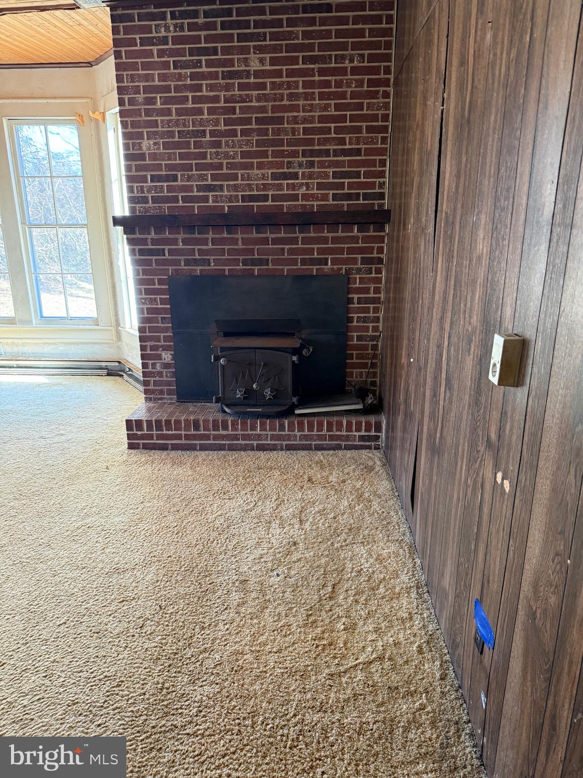564 Front Street Houston, DE 19954 - Photo 19 of 34 a view of an empty room with a fireplace