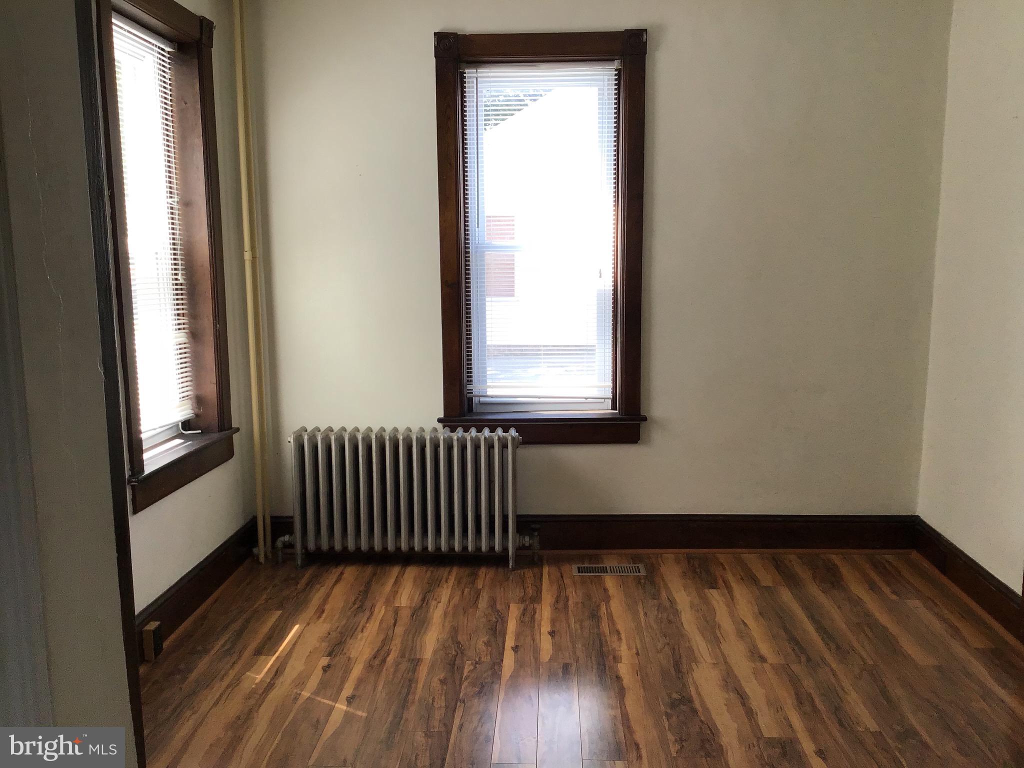 1822 East Main Street Waynesboro, PA 17268 - Photo 17 of 21 a view of a room with wooden floor and a window