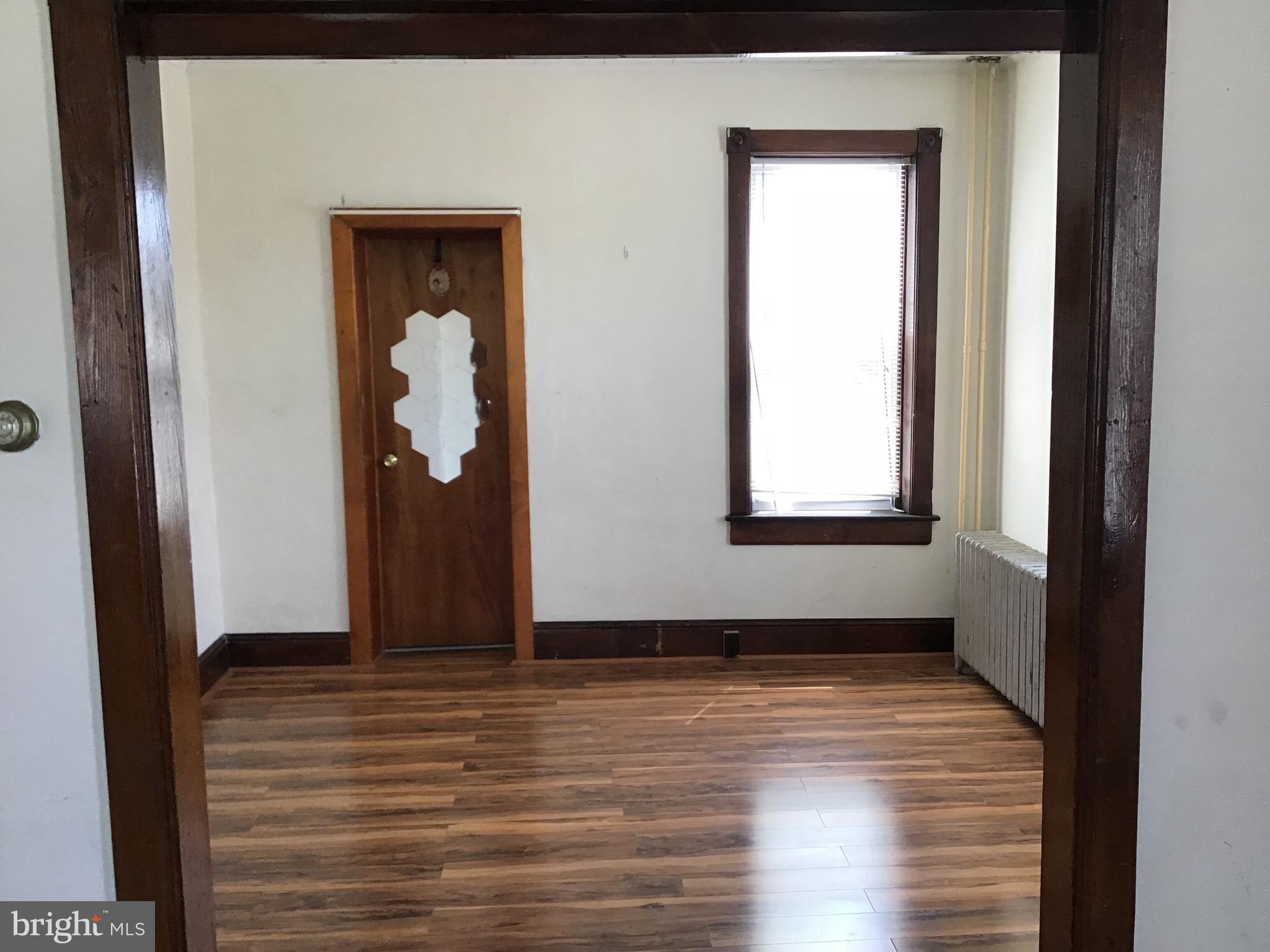 1822 East Main Street Waynesboro, PA 17268 - Photo 7 of 21 a view of a small space with wooden floor and a window
