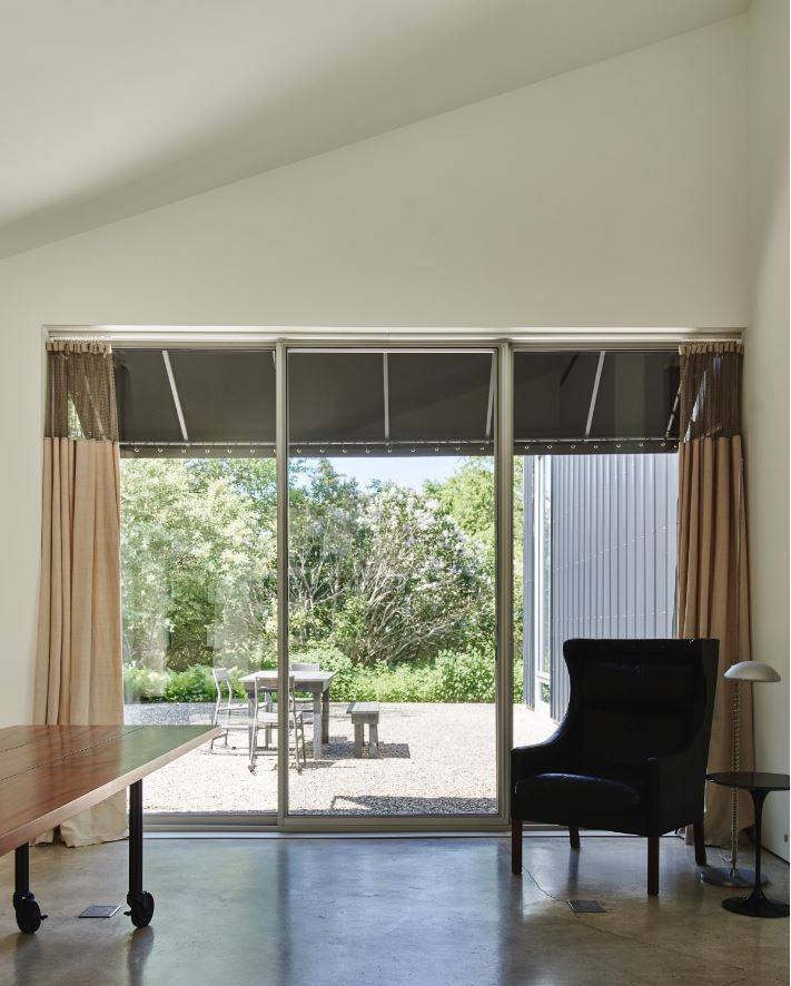 78 Windmill Lane Water Mill, NY 11976 - Photo 12 of 26 a living room with furniture and a window