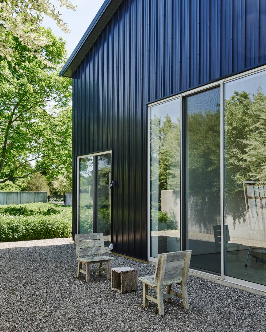 78 Windmill Lane Water Mill, NY 11976 - Photo 21 of 26 a backyard of a house with outdoor seating