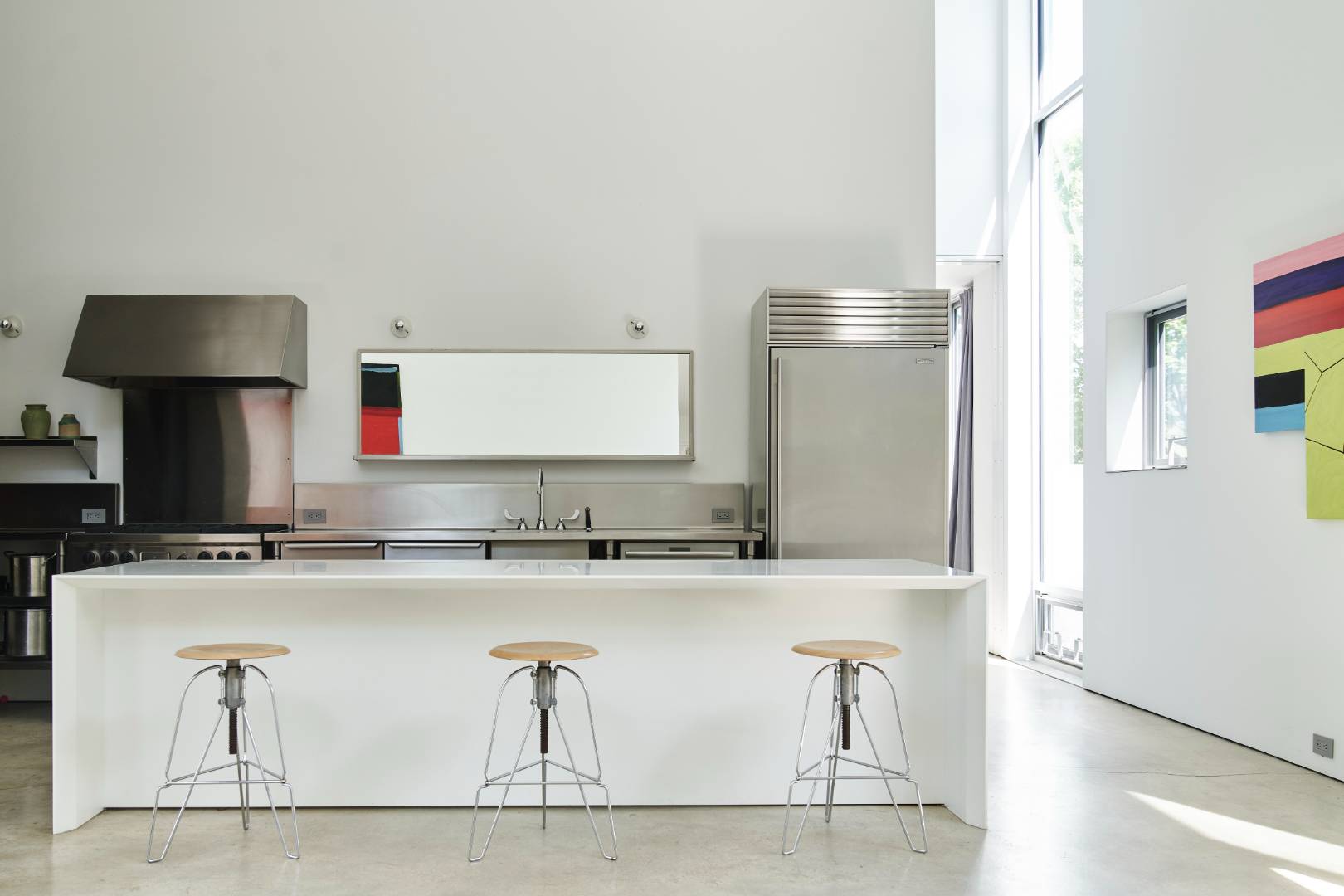 78 Windmill Lane Water Mill, NY 11976 - Photo 7 of 26 a kitchen with stainless steel appliances granite countertop a sink a stove and a refrigerator