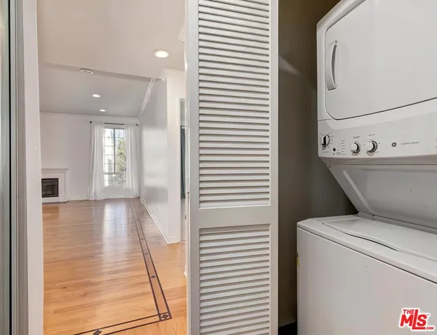 a view of livingroom with washer and dryer