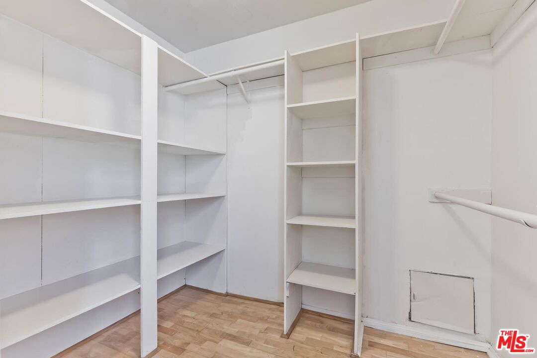 1169 Wellesley Avenue, Unit 101 Los Angeles, CA 90049 - Photo 19 of 26 a view of an empty walk in closet