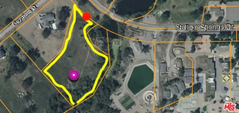 a view of an entryway with a lot of stuff