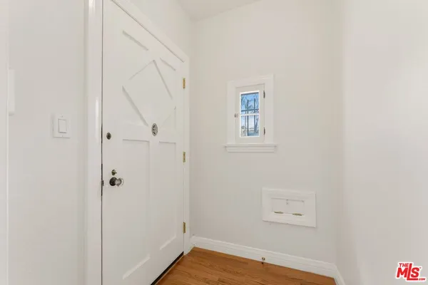 a view of a room that has a window in it