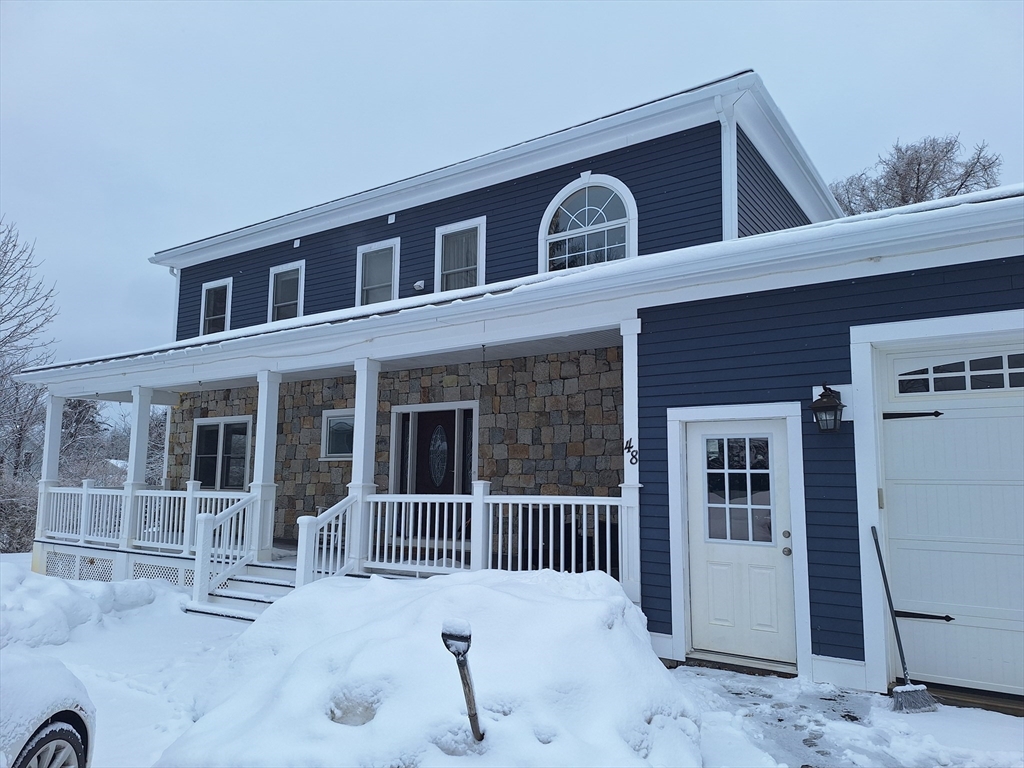 48 Gee Avenue, Unit B Gloucester, MA 01930 - Photo 10 of 12 a front view of a house with a porch