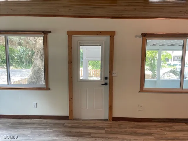 a view of a room that has a window