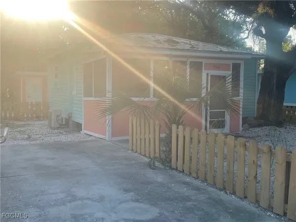 a view of a house with a street