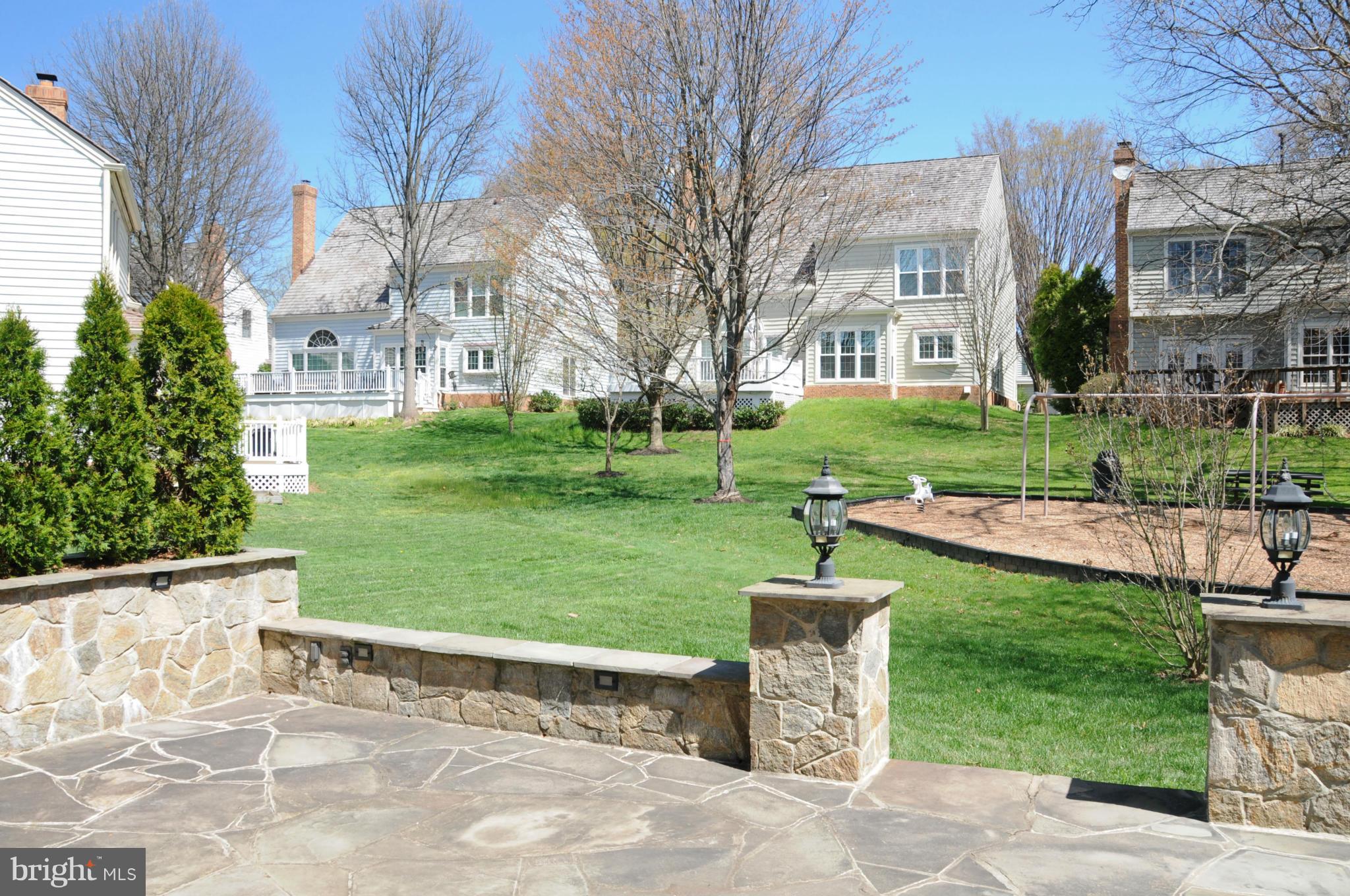9731 Hidden Valley Road Vienna, VA 22181 - Photo 28 of 30 FLAGSTONE PATIO WITH ACCENT LIGHTING