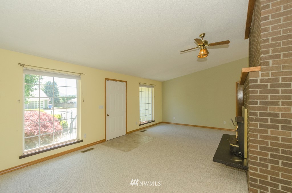 157 Galaxie Road Chehalis, WA 98532 - Photo 4 of 21 a view of empty room with windows