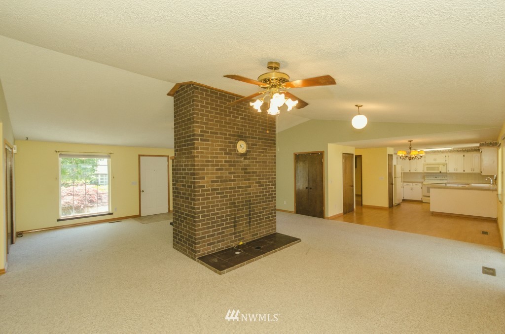 157 Galaxie Road Chehalis, WA 98532 - Photo 5 of 21 a view of a livingroom with a chandelier