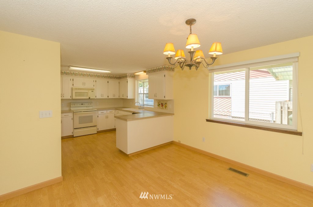 157 Galaxie Road Chehalis, WA 98532 - Photo 9 of 21 a view of a kitchen with a sink and cabinet