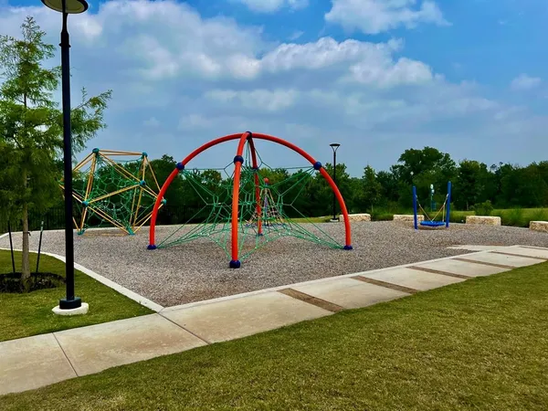 a view of park with swings