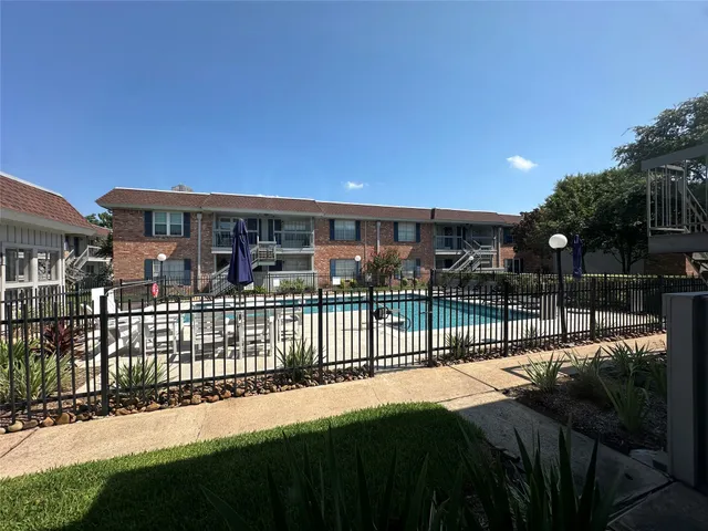 a front view of house yard and deck
