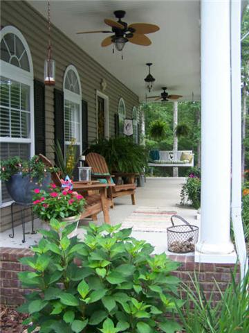 The front porch is extra deep and the perfect place to relax !
