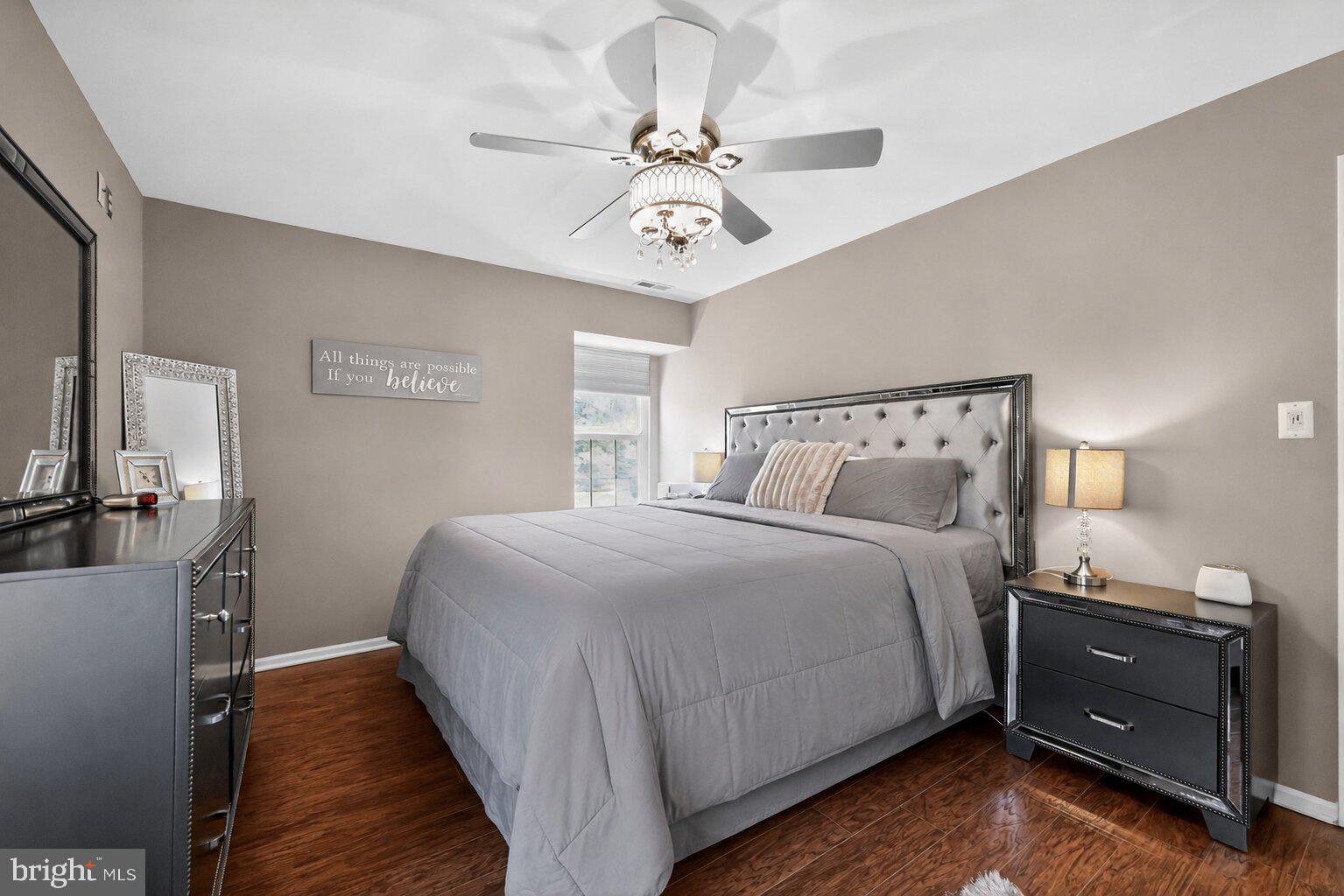 213 Tavistock Road Cherry Hill, NJ 08034 - Photo 14 of 24 a bedroom with a bed and a chandelier