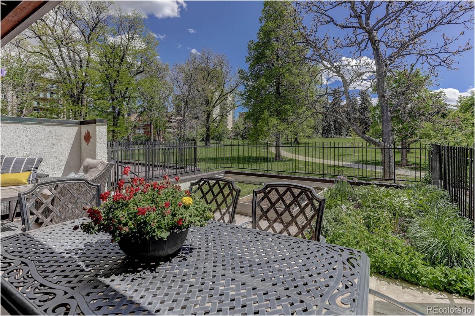 1291 High Street, Unit F Denver, CO 80218 - Photo 14 of 35 a view of a backyard with a garden