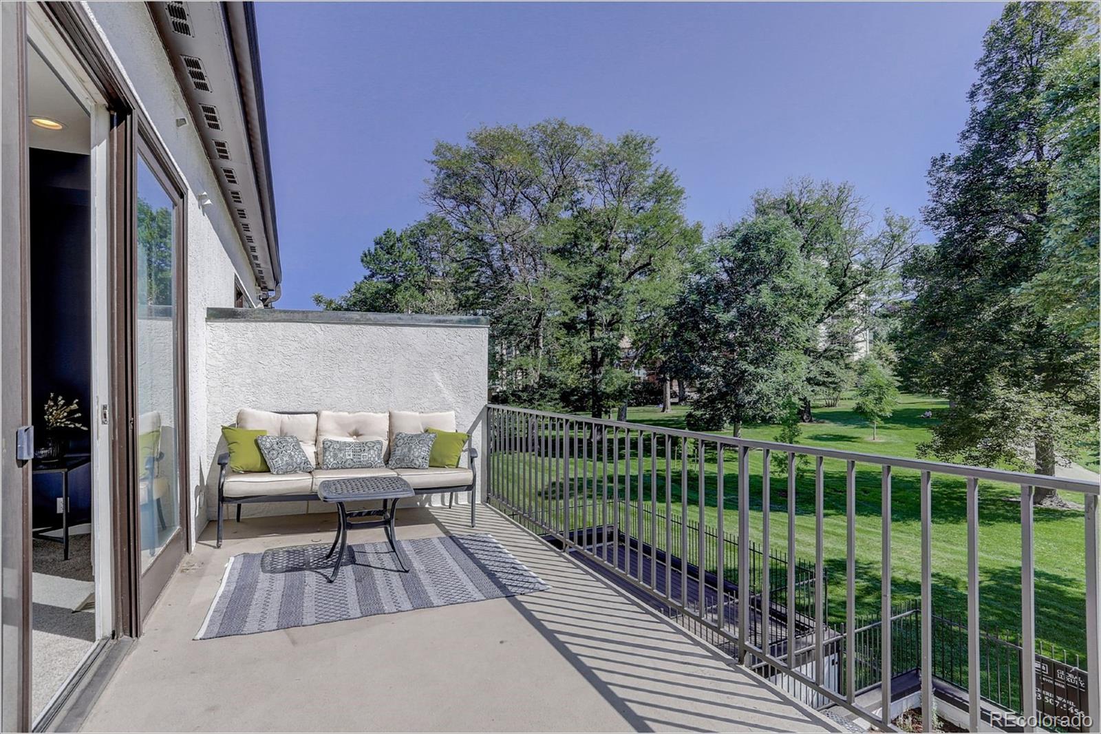1291 High Street, Unit F Denver, CO 80218 - Photo 24 of 35 a view of a balcony with chairs