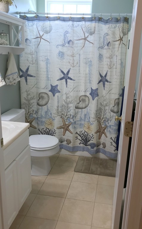 343 Quarry Street, Unit 2 Quincy, MA 02169 - Photo 15 of 30 a bathroom with a toilet and a shower